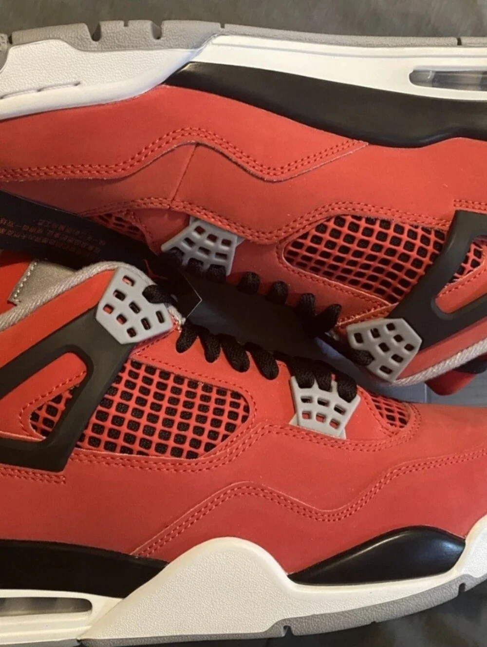 Jordan 4 Men's Retro Sneakers in Red and Black with White Accents